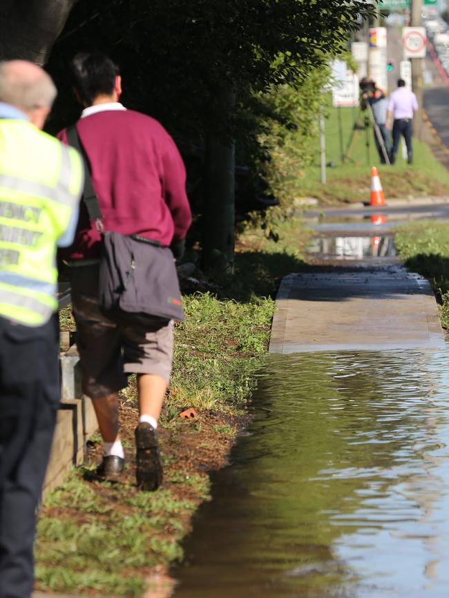 Sydney’s storms drains are taking time to absorb the huge amount of water in Milperra. Picture: John Grainger