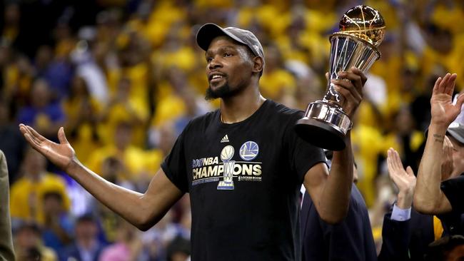 Kevin Durant with the Bill Russell NBA Finals Most Valuable Player award. Picture: AFP