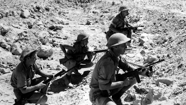 Australian Army soldiers close in at the Tobruk battle in Libya during the Western Desert campaign in World War II in 1941. Picture: Australian War Memorial.