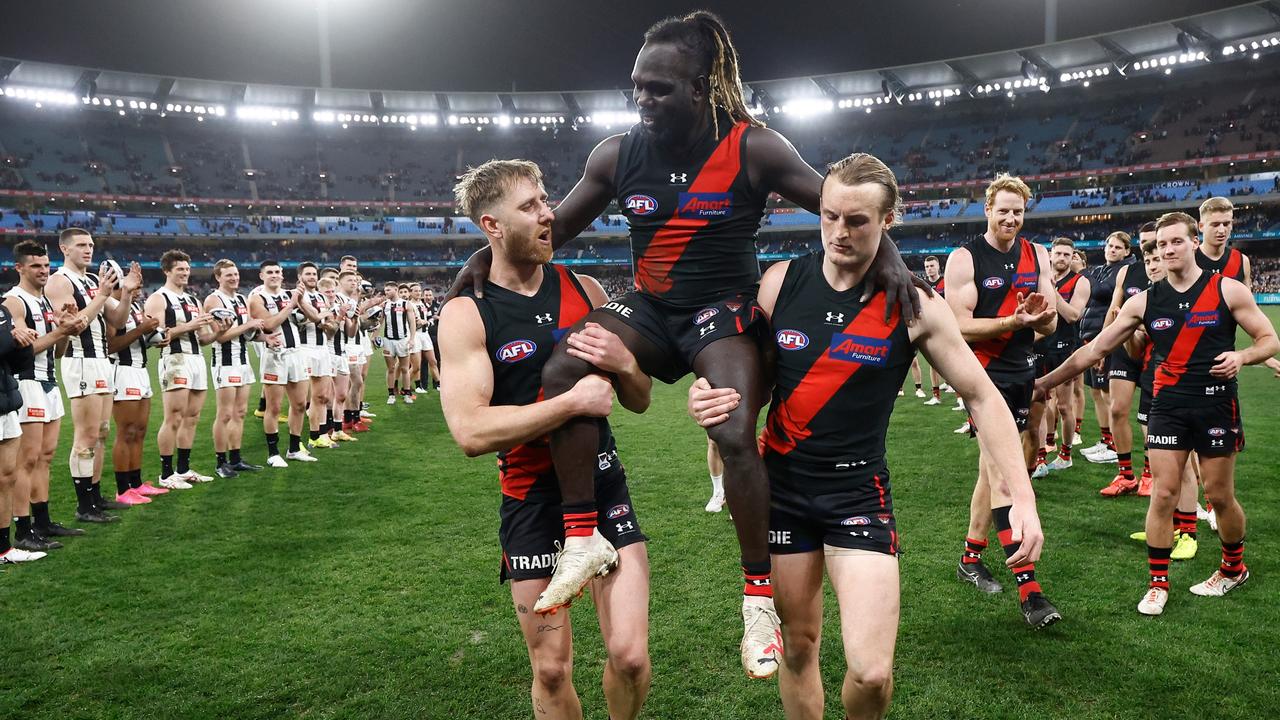 Anthony McDonald-Tipungwuti is chaired from the field. Picture: Michael Willson/AFL Photos via Getty Images