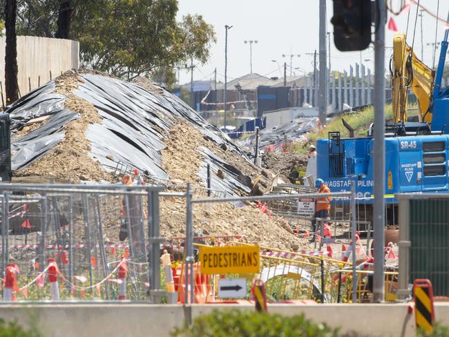 A mound of soil from the Westgate tunnel project covered in black tarp. Picture Jay Town