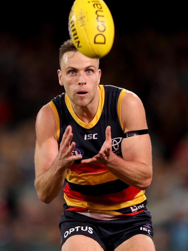 Brodie Smith of the Crows marks the ball during the 2019 AFL round 20 match between Adelaide and the St Kilda Saints at the Adelaide Oval on August 3, 2019. Picture: JAMES ELSBY/AFL PHOTOS VIA GETTY IMAGES