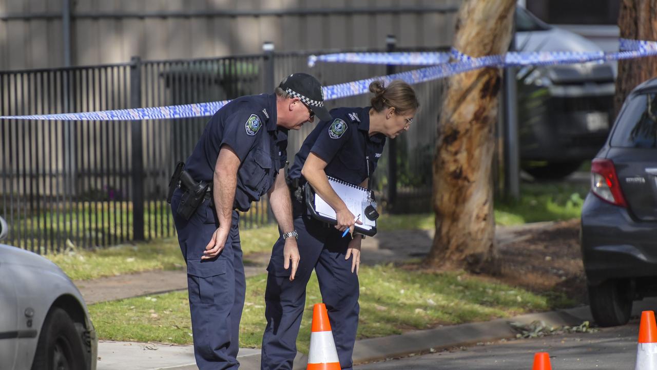 Officers at the scene in Parafield Gardens. Picture: RoyVPhotography