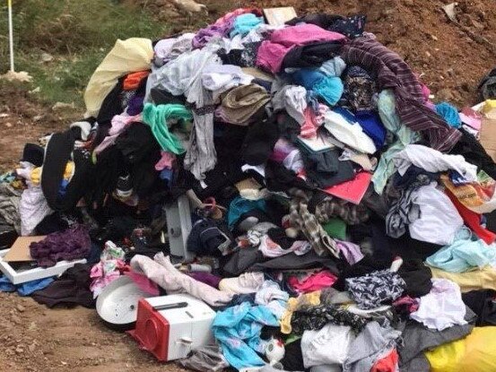 Clothes dumped at a waste facility.