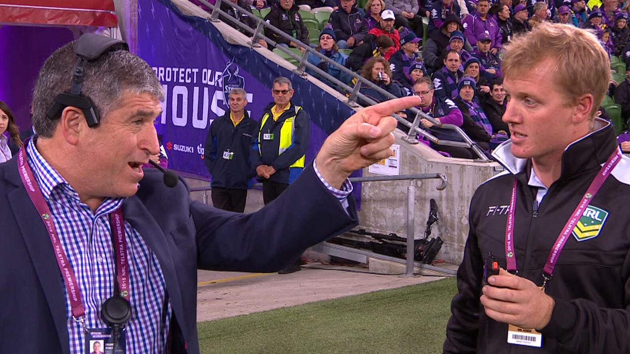 Storm officials confront NRL officials.