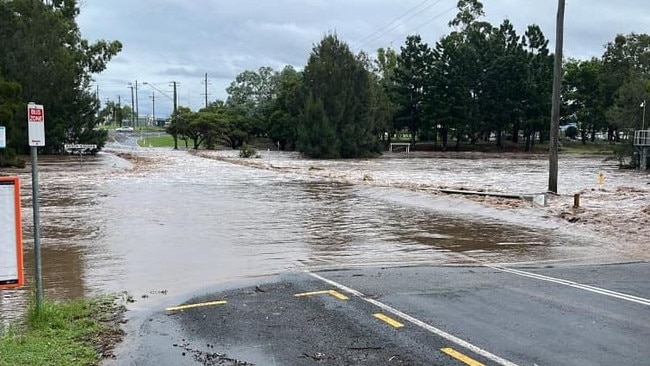 Water over a road on the Sunshine Coast. Photo: Higgins