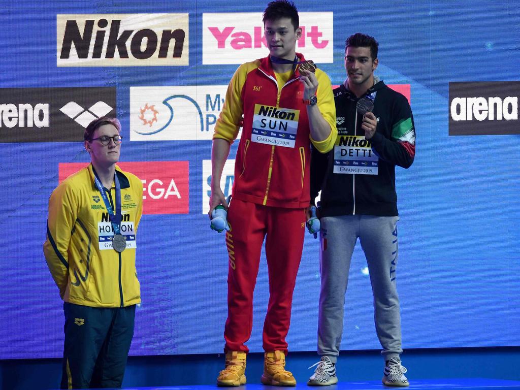 Mack Horton (left) refuses to share the podium with Sun. (Photo by Ed JONES / AFP)