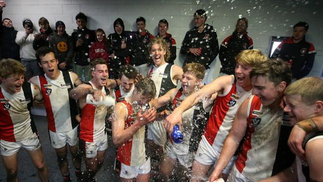 Koroit players including 15-year-old debutant Talor Byrne celebrate their thrilling win against Terang-Mortlake. Pictures: Yuri Kouzmin