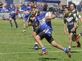 IN FLIGHT: Lockie McLaughlin en route to the line for the Grafton Ghosts against the Clarence Coast Magpies. Picture: Mitchell Keenan