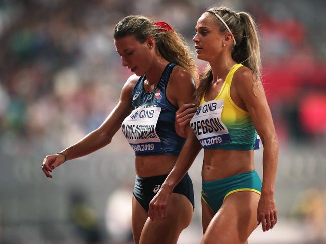 Ophelie Claude-Boxberger of France and Genevieve Gregson of Australia react after competing in the Women's 3000 metres Steeplechase heats during day one of 17th IAAF World Athletics Championships Doha 2019 at Khalifa International Stadium on September 27, 2019 in Doha, Qatar. (Photo by Christian Petersen/Getty Images)