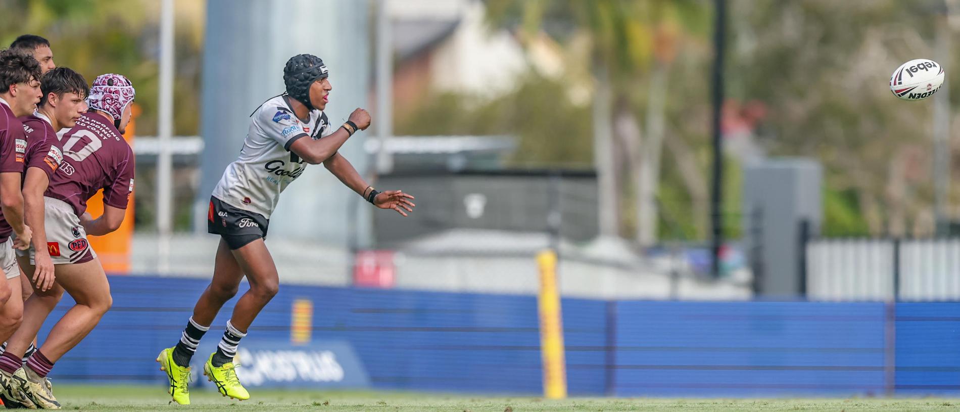 Jayden Solien of Souths Logan fires off a pass. Photography by Stephen Archer