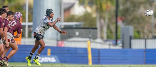 Jayden Solien of Souths Logan fires off a pass. Photography by Stephen Archer