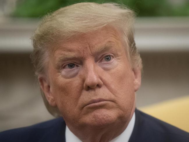 President Donald Trump listens to a question during a meeting with Greek Prime Minister Kyriakos Mitsotakis in the Oval Office of the White House, Tuesday, Jan. 7, 2020, in Washington. (AP Photo/Alex Brandon)