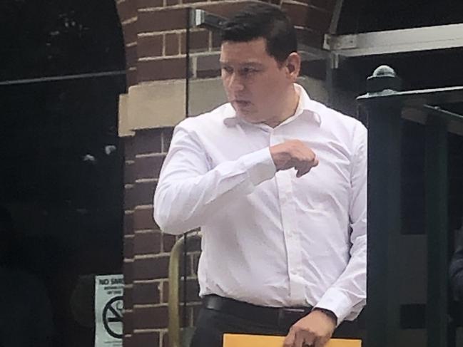 Roberto Gutierrez-Duran (left), 33, a design consultant of Crows Nest, outside Manly Local Court on Wednesday where he was convicted of assault occasioning actual bodily harm for punching a BMW driver twice in the head for blocking a pedestrian crossing while he was trying to cross with his six-year-old daughter and a pet dog. Picture: Manly Daily