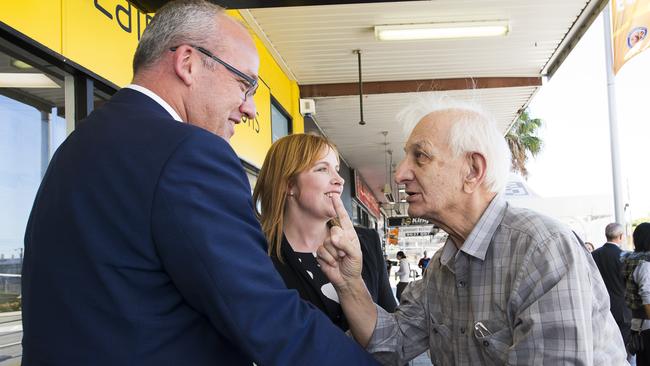 Taking advice in a pre-election flesh-press in Granville in 2015. Picture: Chris McKeen