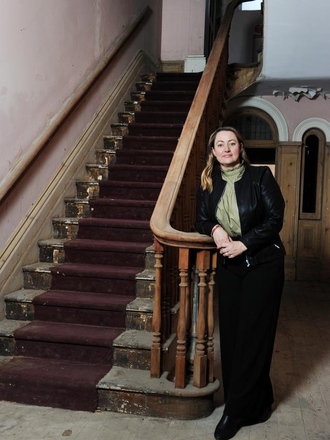 Fiona Fiorinotto and the grand staircase inside Davaar House. Picture: Michael Marschall