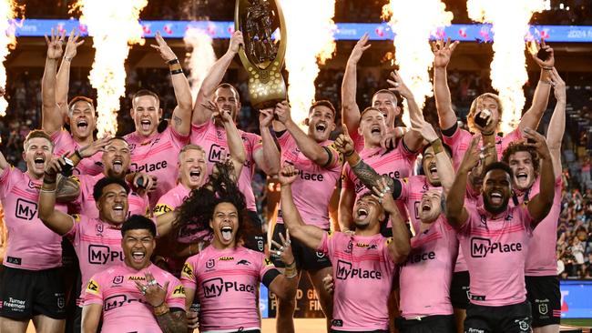 SYDNEY, AUSTRALIA - OCTOBER 06: Isaah Yeo and Nathan Cleary of the Panthers hold aloft the Provan-Summons Trophy after winning the 2024 NRL Grand Final match between the Melbourne Storm and the Penrith Panthers at Accor Stadium on October 06, 2024, in Sydney, Australia. (Photo by Quinn Rooney/Getty Images) *** BESTPIX ***