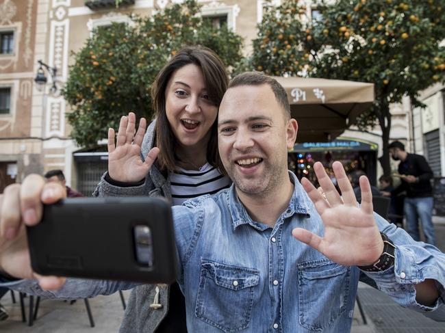 Nathan Webb, pictured with girlfriend Carla Barranco Compta, has stayed in touch with family back home with regular video calls. Picture: Ella Pellegrini