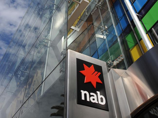 The National Australia Bank Ltd. (NAB) logo marks the entrance to the company's headquarters in the Docklands, Melbourne, Australia, on Wednesday, Sept. 8, 2010. The Australian Competition and Consumer Commission (ACCC) plans to make a decision by Sept. 9 on National Australia Bank Ltd.'s bid for Axa Asia Pacific Holdings Ltd. Photographer: Carla Gottgens/Bloomberg