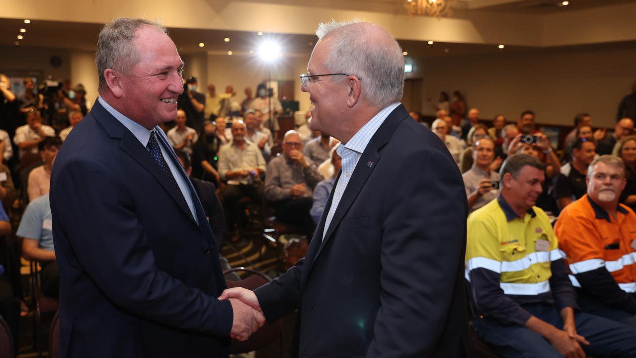 Prime Minister Scott Morrison shakes hands with deputy prime minister Barnaby Joyce. Picture: Jason Edwards