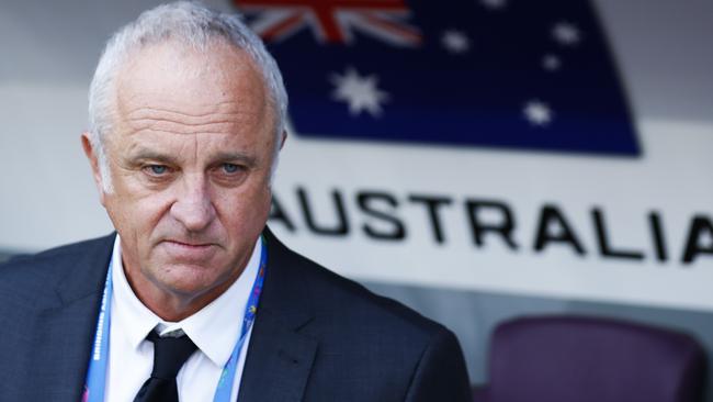 Graham Arnold has his hands full at the Asian Cup. (AP Photo/Hassan Ammar)