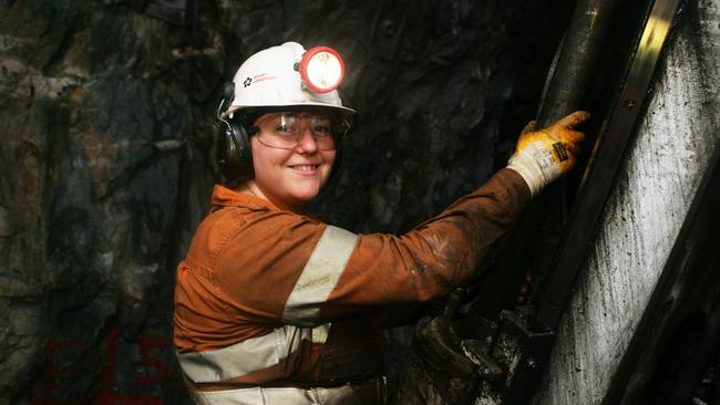 Underground miner Amelia Gallagher operates a diamond drill at the Henty Gold on the West Coast of Tasmania