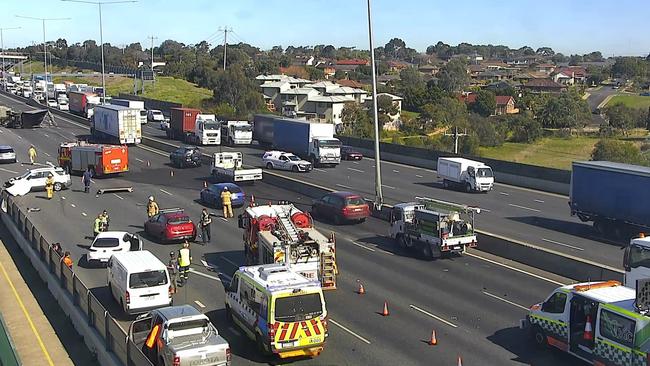 Emergency services at a truck rollover that closed the Western Ring Road. Picture: VicTraffic Facebook