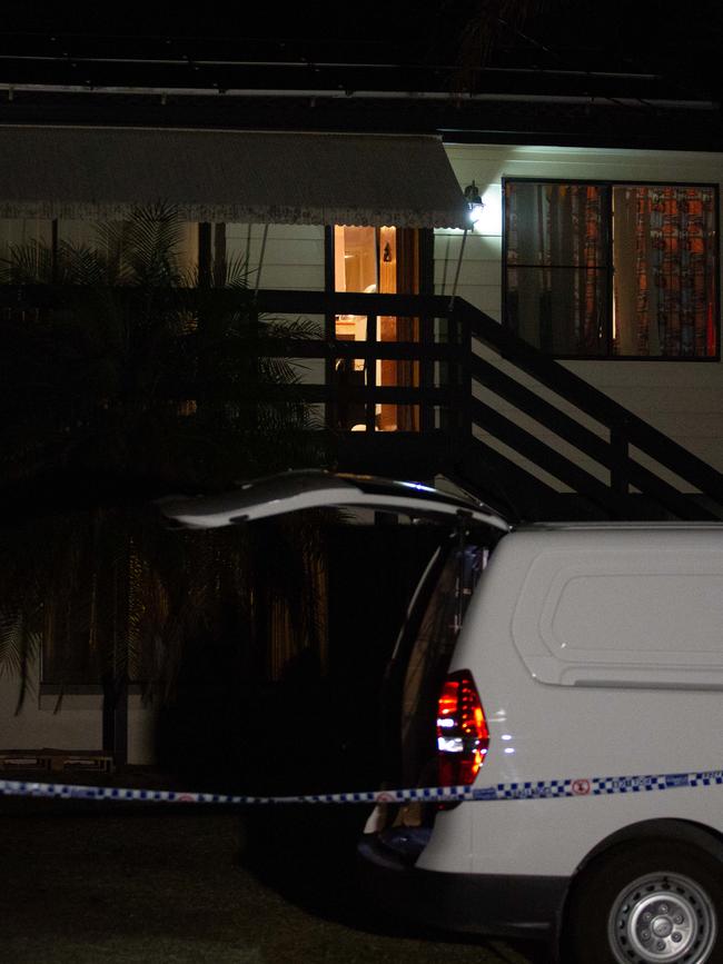 Police at the scene where Erica and Lachlan Bond were found dead.