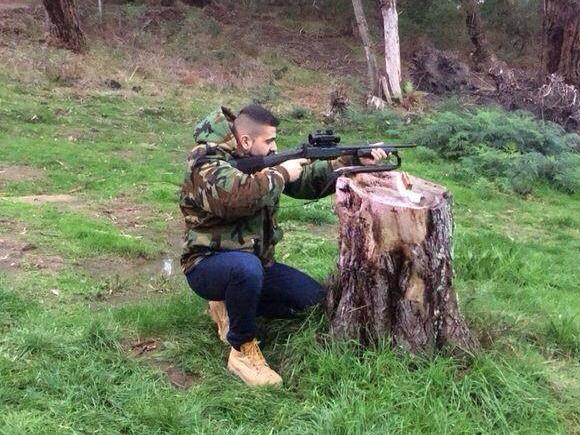 Hassan Barakat pictured holding a firearm despite Victoria Police slapping him with a Firearm Prohibition Order.