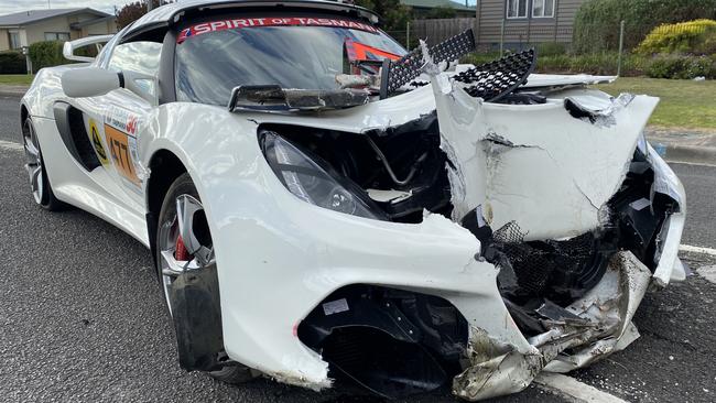 The mangled remains of the Lotus Exige Sport 350 which Peter Taylor and navigator Tristan Taylor walked away from after crashing into a power pole that stopped the George Town stage for 49 minutes. Picture: James Bresnehan