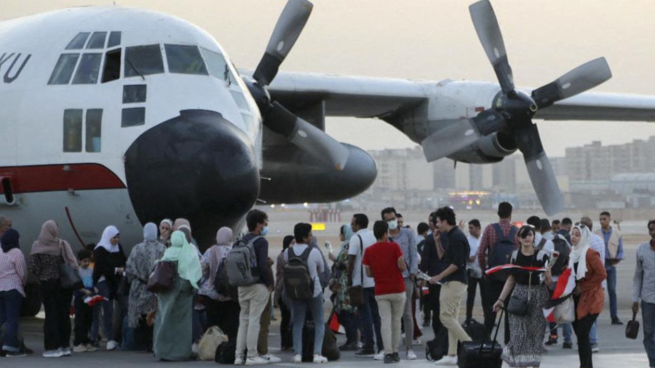 The warning comes as hundreds evacuate the conflict-ravaged country. Picture: Egyptian Armed Forces / AFP