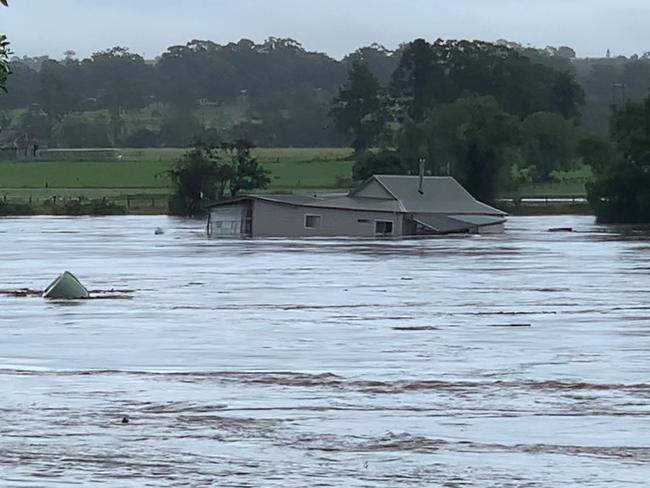 A house swept away in floodwaters in West Taree, NSW. Picture: Robert Cribb / Severe Weather Australia