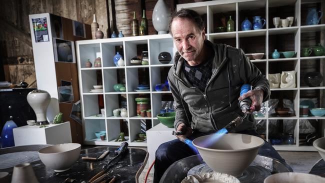 Studio Potter Ian Clare making a salad bowl at Cygnet. Picture Chris Kidd