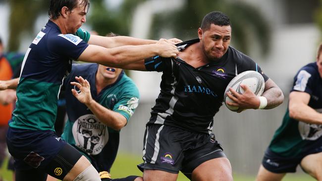 Southside's Molia Feleleai palms off Port's Darcy Cotton. PICTURE: BRENDAN RADKE.