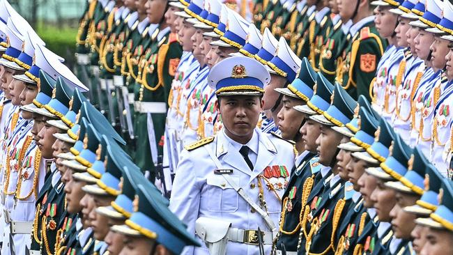 A military welcome is rolled out for Vladimir Putin in Hanoi. Picture: AFP