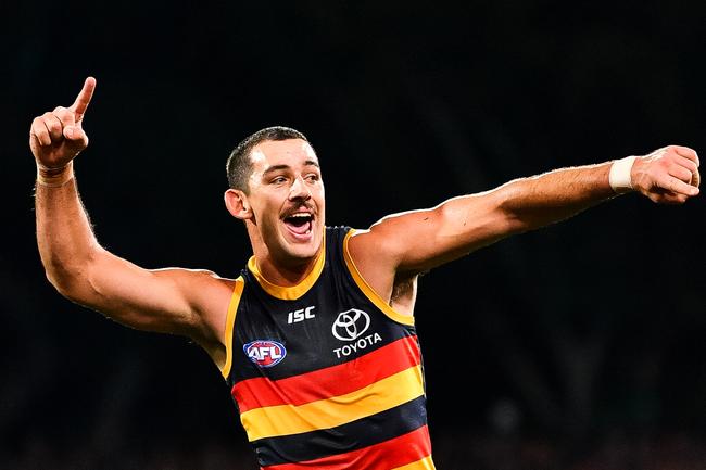 Adelaide’s Taylor Walker celebrates after kicking a goal to seal the victory over Port Adelaide in Showdown 46 at Adelaide Oval . Picture: Daniel Kalisz/Getty