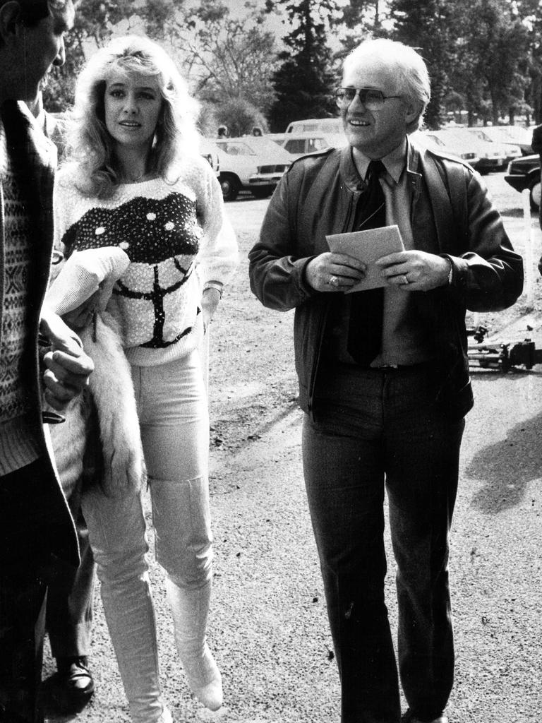 Edelsten and wife Leanne arrive at a Carlton v Sydney game in 1985.