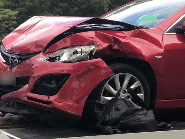 A wrecked Mazda station wagon, driven by a woman in her 80s, involved in a three-car crash on Warringah Rd at Forestville on Thursday afternoon, October 24, 2024. The collision resulted in the  elderly woman and a man in his 30s being injured and taken to Northern Beaches Hospital.