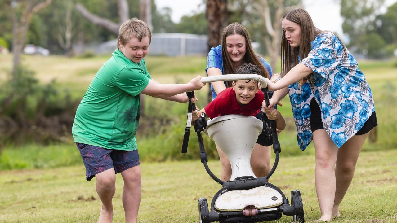 In the dunny race are (from left) Zane, Clancy Carter, Sasha Lee and Jessica Lee at the Oakey Australia Day celebrations, Wednesday, January 26, 2022. Picture: Kevin Farmer