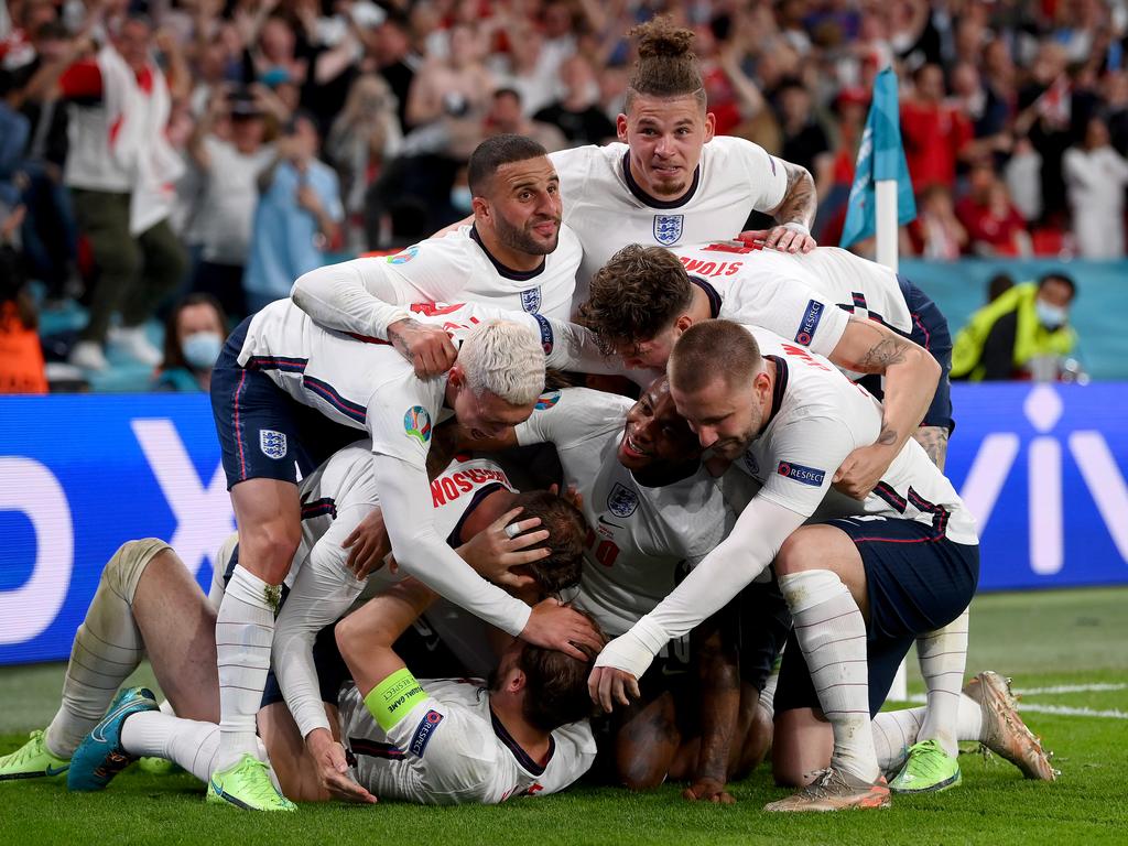 England hero Harry Kane is under there somewhere. (Photo by Laurence Griffiths/Getty Images)