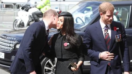 Meghan Markle kisses Prince William. Picture: Supplied