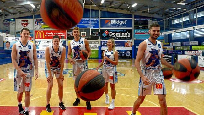 Rockhampton basketballers Shaun Bruce, Jacinta Vandenberg, Nelson Kahler, Brooke Blair and Jimmy Mitchell model the new Project Booyah kit. Picture: Jann Houley