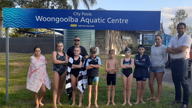 Division 1 councillor Mark Hammel, right, with locals who had hoped to keep the Woongoolba Aquatic Centre open.