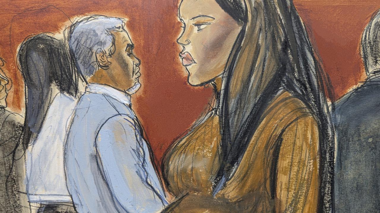 Cassie Ventura, right, walks out of the courtroom past Sean Diddy Combs after testifying in Manhattan federal court, Tuesday, May 13, 2025, in New York. (Elizabeth Williams via AP)