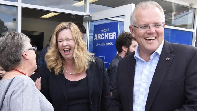 Prime Minister Scott Morrison and Liberal candidate Bridget Archer greet Liberal supporters at the opening of the party’s Bass campaign office in Launceston, Tasmania, on Saturday.