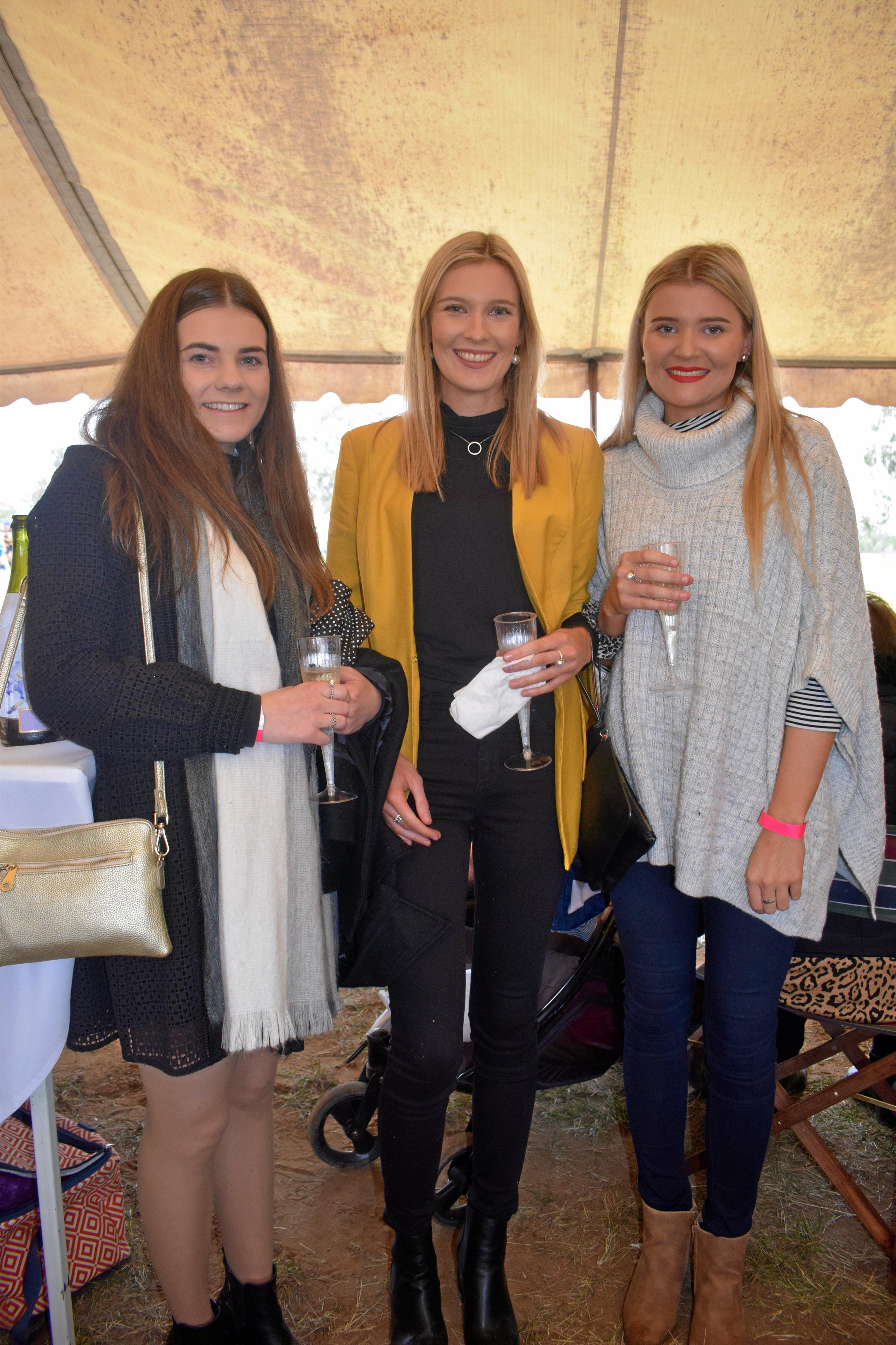 Alyce Cover, Annabelle Murphy, and Ella Murphy at the Condamine Cods Annual Ladies Day, June 8. Picture: Brooke Duncan