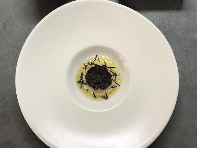 White asparagus, aged manchego consomme and black truffle. Picture: Supplied