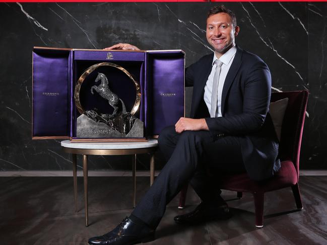 The Everest ambassador Ian Thorpe with the race trophy. Picture: Sam Ruttyn