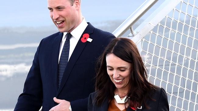 Britain's Prince William (L) arrives with New Zealand's Prime Minister Jacinda Ardern (R) at the Royal New Zealand Air Force (RNZAF) Air Movements Terminal in Christchurch on April 25, 2019. - Prince William paid tribute to Australian and New Zealand troops on April 25 at an emotional Anzac Day ceremony, six weeks after the Christchurch mosques massacre. (Photo by Hannah Peters / POOL / AFP)