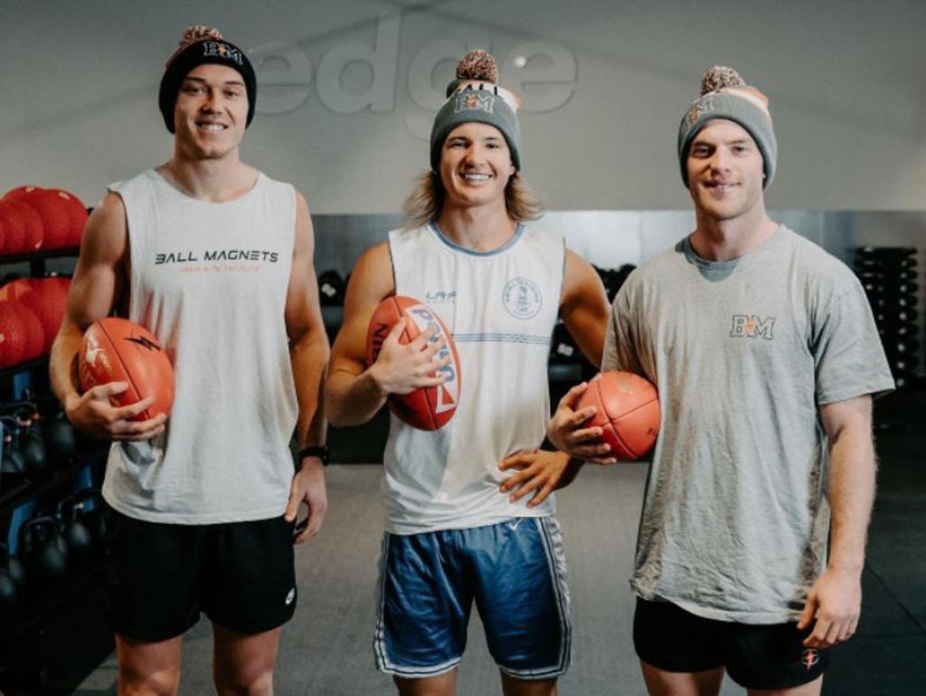 Prime Training founder Tom Baulch (middle) with AFL stars Patrick Cripps and Tom Mitchell. Picture: Prime Training on Instagram